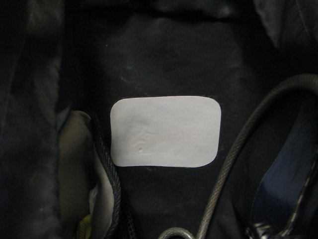 Inside view of the bike bag. A gray rectangle with rounded corners is visible, perhaps 7 by 11 cm.